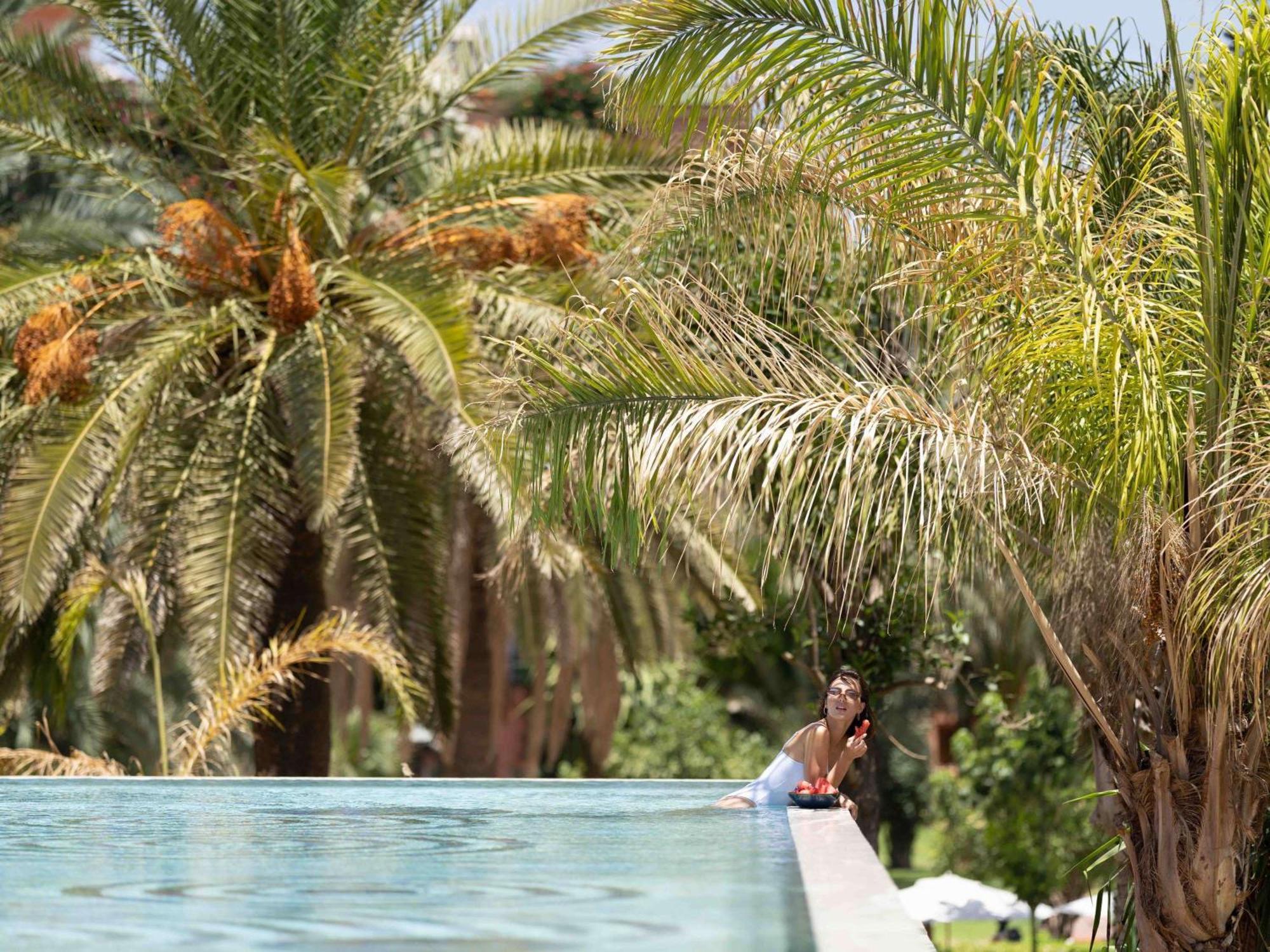 Sofitel Marrakech Palais Imperial & Spa Маракеш Екстериор снимка The swimming pool at the hotel