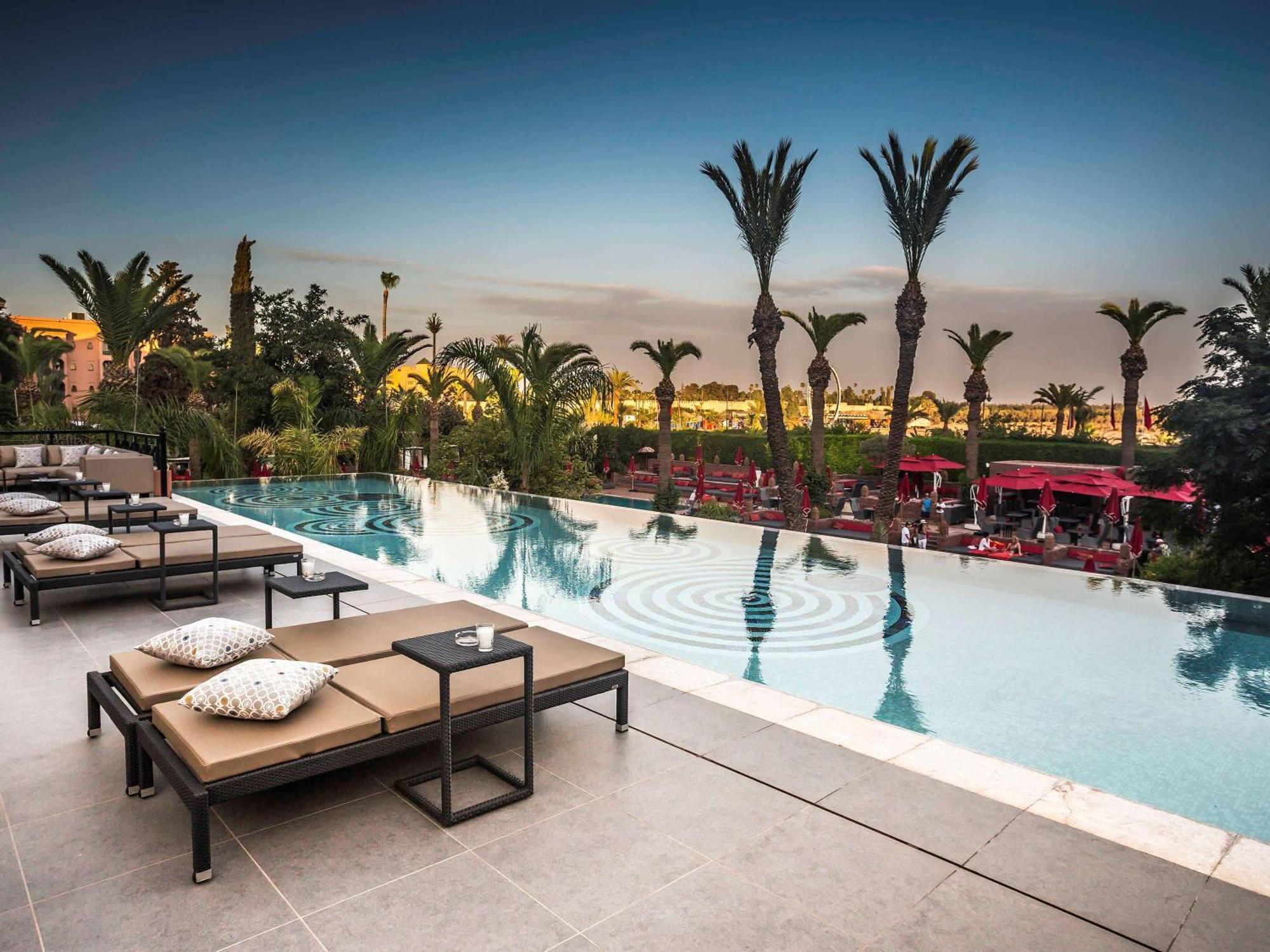 Sofitel Marrakech Palais Imperial & Spa Маракеш Екстериор снимка The pool at the hotel